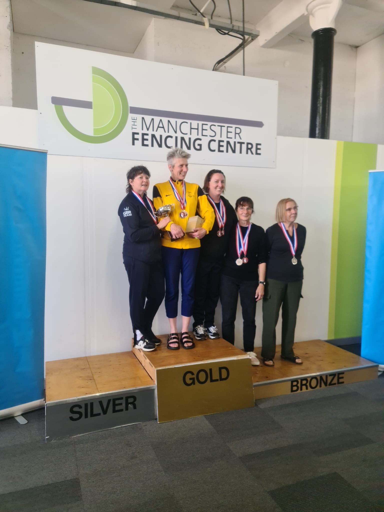 Caron Hale on the Manchester Fencing Centre podium